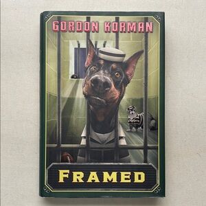 Framed by Gordon Korman Hardcover Book